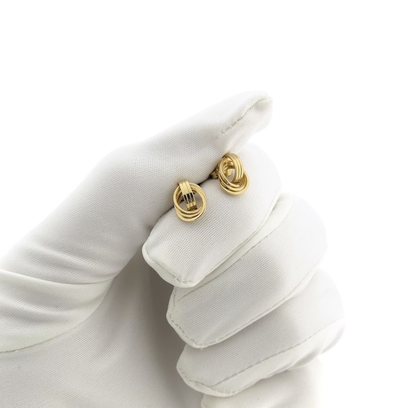 Image 11 of Gold stud earrings as a button