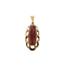 Vintage gold pendant with garnet stone