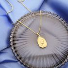 Image 2 of Golden pendant of Mary