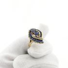 Image 7 of Gold ring with sapphires and diamonds; 0.10 ct.