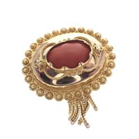 Antique gold brooch with blood coral; Filigree