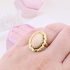 Image 7 of Gold ring set with angel skin coral