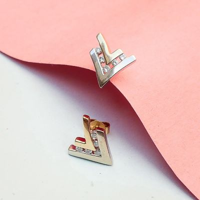 Image 2 of Bicolor gold stud earrings with diamond; 0.20 ct.