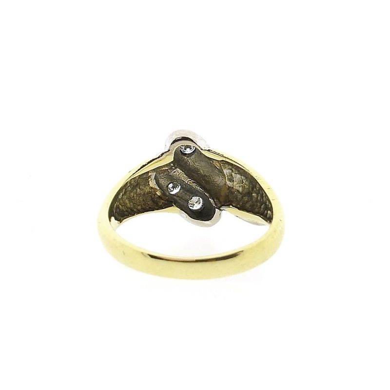 Image 4 of Two-tone gold solitaire ring with 0.105 ct diamond.