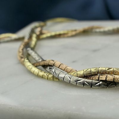 Image 2 of Exclusive gold braided omega link necklace.