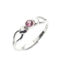 Silver ring with pink zirconia stone