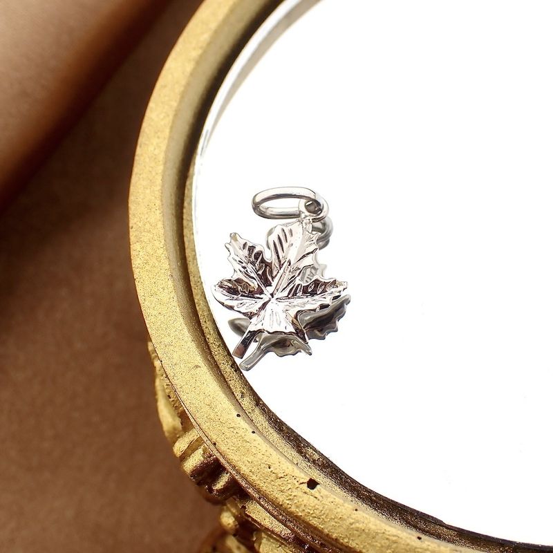 Image 5 of 18 carat white gold maple leaf pendant