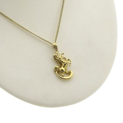 Image 2 of 18 carat gold pendant of a horse with foal