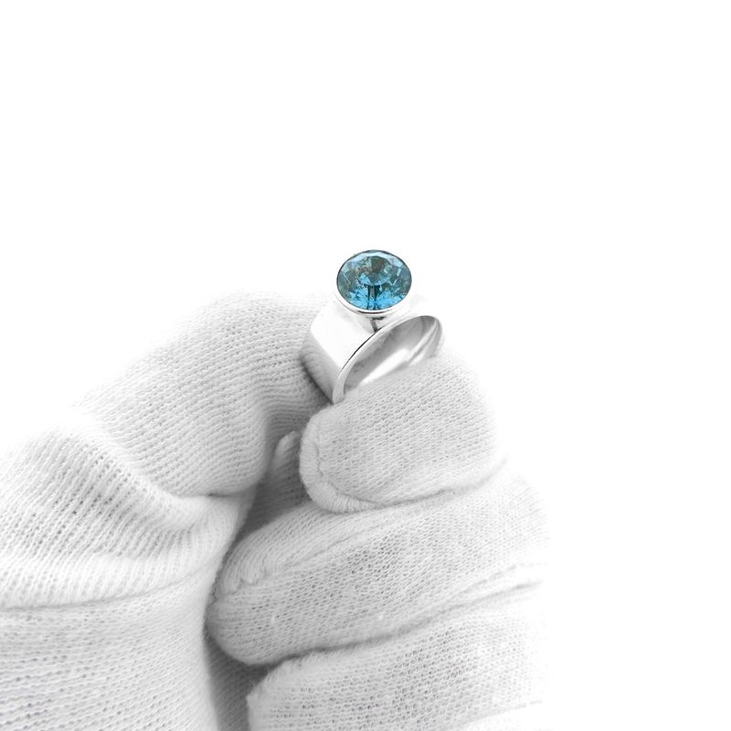 Image 8 of Silver wide ladies ring with blue zirconia
