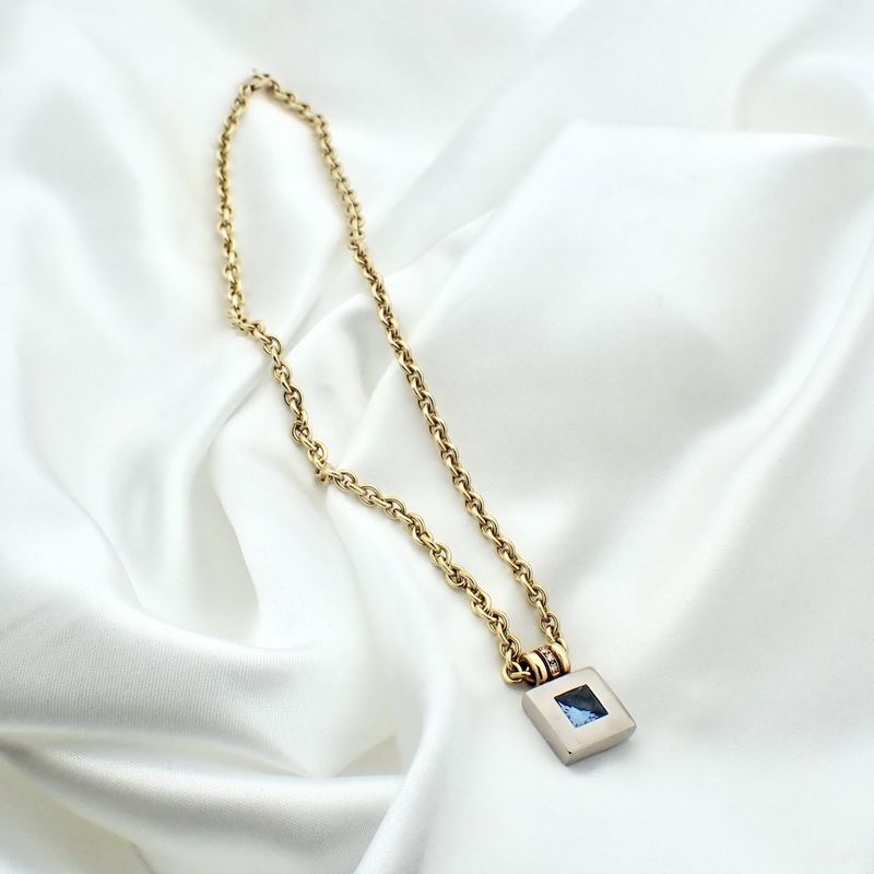 Image 5 of Two-tone gold necklace with topaz and diamond; 0.06 ct.