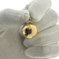 Two-tone gold globe pendant