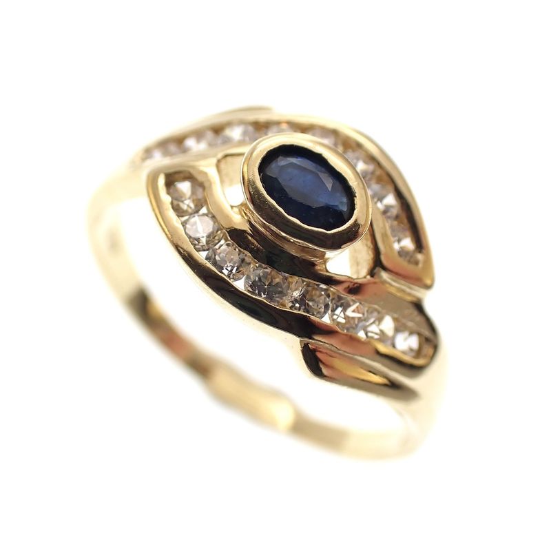 Image 1 of 18 carat gold ring with zirconia and sapphire eye