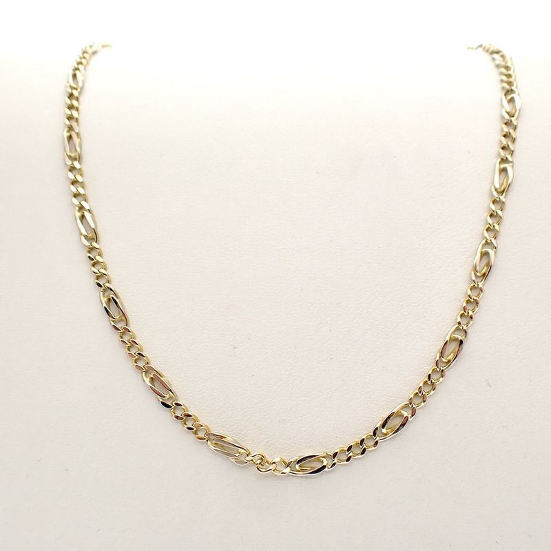 Image 1 of Two-tone gold Figaro link chain.
