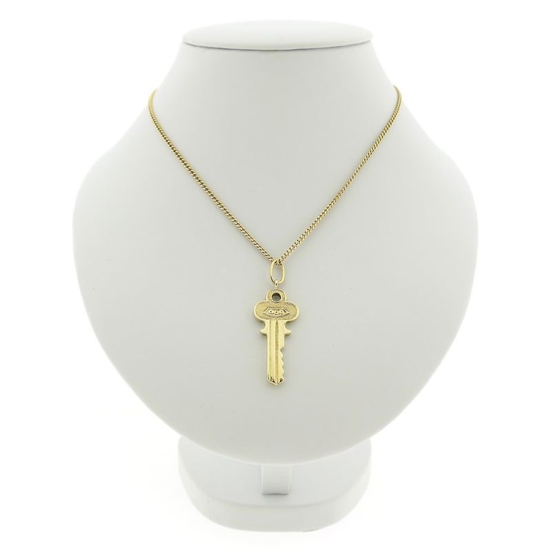 Image 3 of 18 carat gold pendant of a key