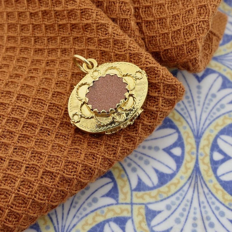Image 2 of 18 carat gold pendant with goldstone