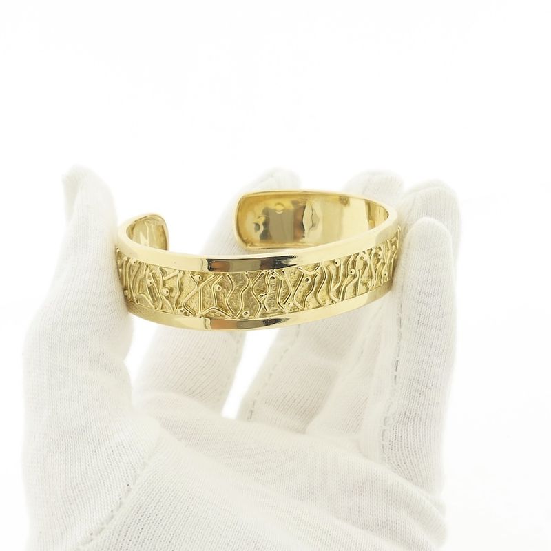 Image 2 of Gold wide slave bracelet with engravings; Size M