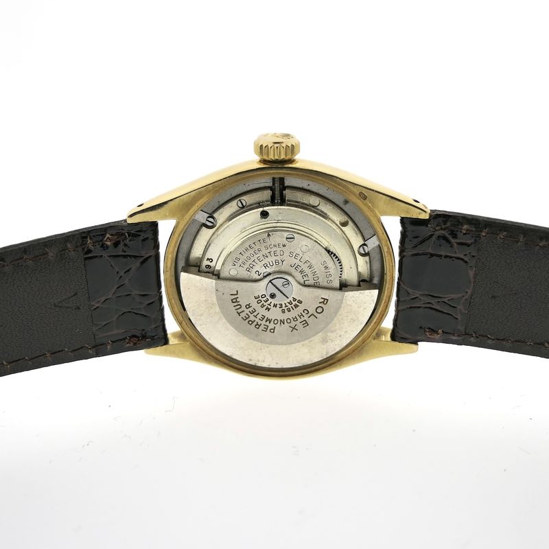 Image 25 of Rolex Oyster Perpetual 6085; Vintage 18k gold watch from 1953