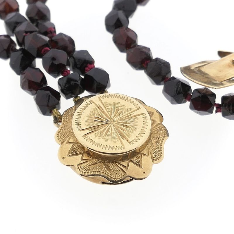 Image 8 of Antique garnet bead necklace with gold decorative clasp.