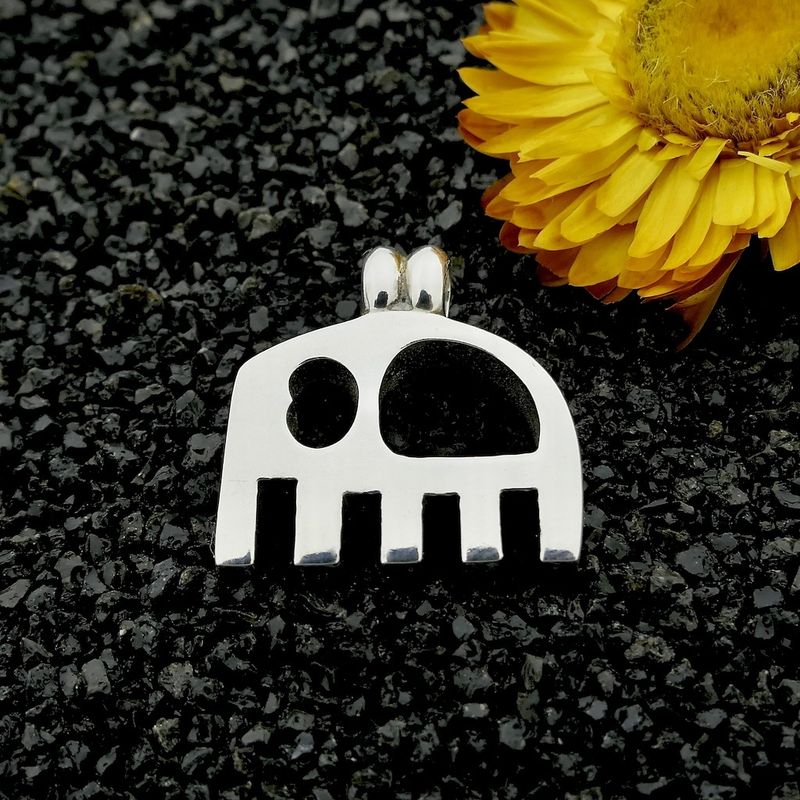 Image 2 of Solid silver pendant of an abstract elephant.