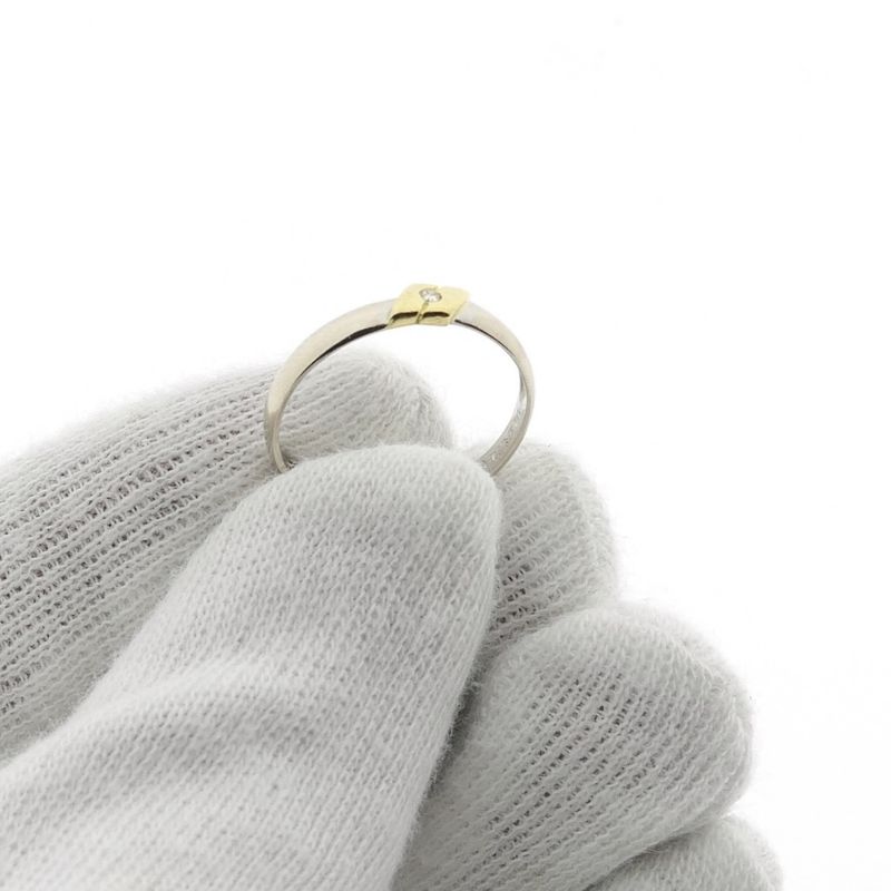 Image 6 of 18-karat bicolor solitaire ring with 0.01 ct. diamond