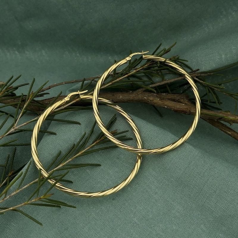 Image 2 of Gold twisted earrings | Ø 54.5 mm