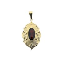 Vintage gold pendant with garnet.