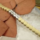 Image 7 of Two-tone gold bracelet with diamonds; 0.24 ct.