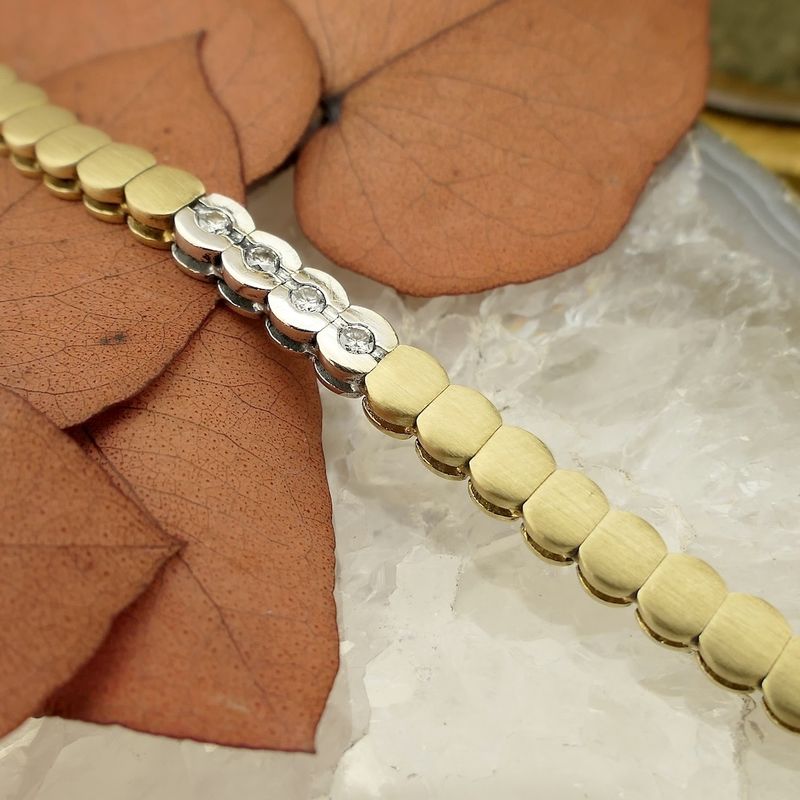 Image 7 of Two-tone gold bracelet with diamonds; 0.24 ct.