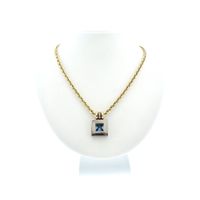 Two-tone gold necklace with topaz and diamond; 0.06 ct.
