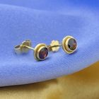Image 2 of Gold stud earrings with garnet