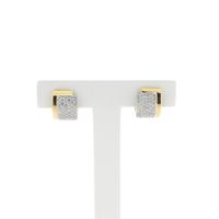 Two-tone gold hinged hoop earrings, pavé, with diamonds; approx. 0.51 ct.