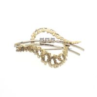 Two-tone gold fantasy brooch with zirconia