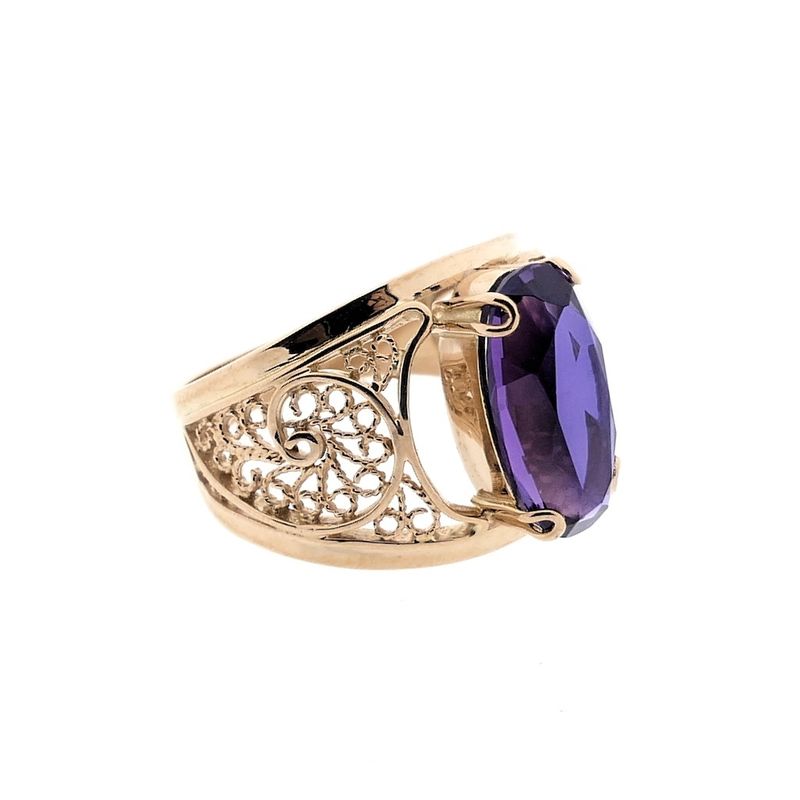 Image 5 of Vintage rose gold ring set with a synthetic purple gemstone.