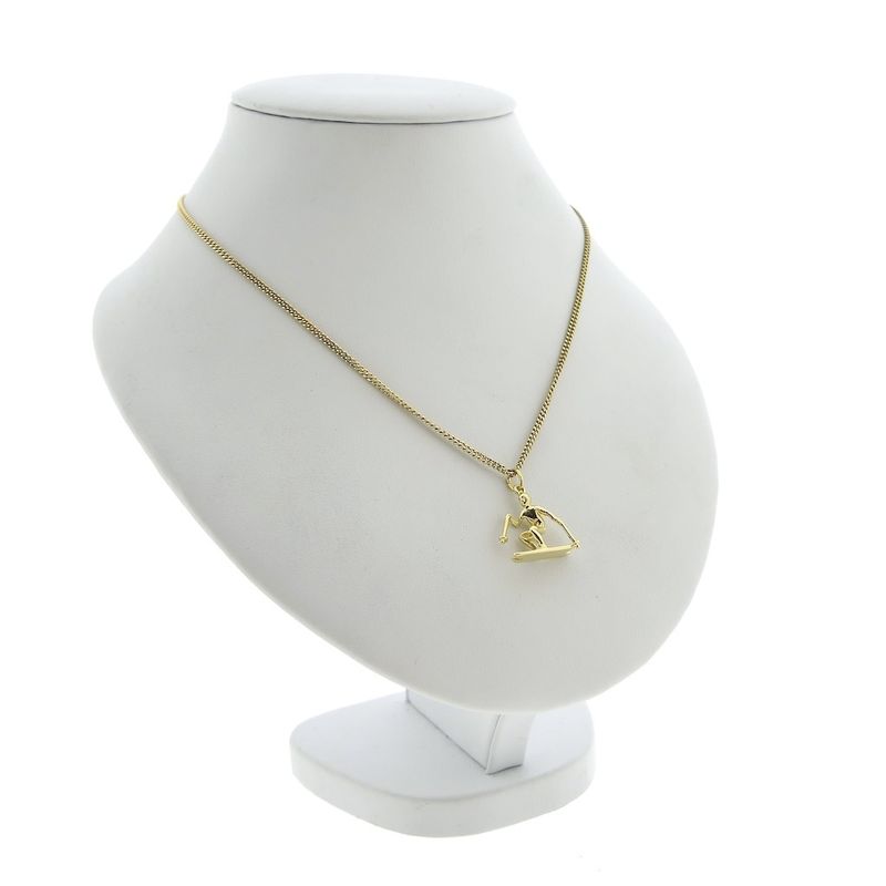 Image 4 of Gold pendant of a skier