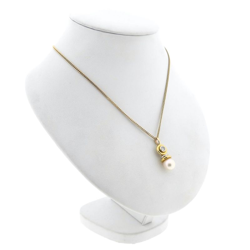 Afbeelding 4 van Bicolor gouden hanger met parel en diamant; 0,20 ct.