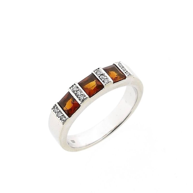 Image 1 of White gold ring with orange tourmaline and diamonds; 0.12 ct.