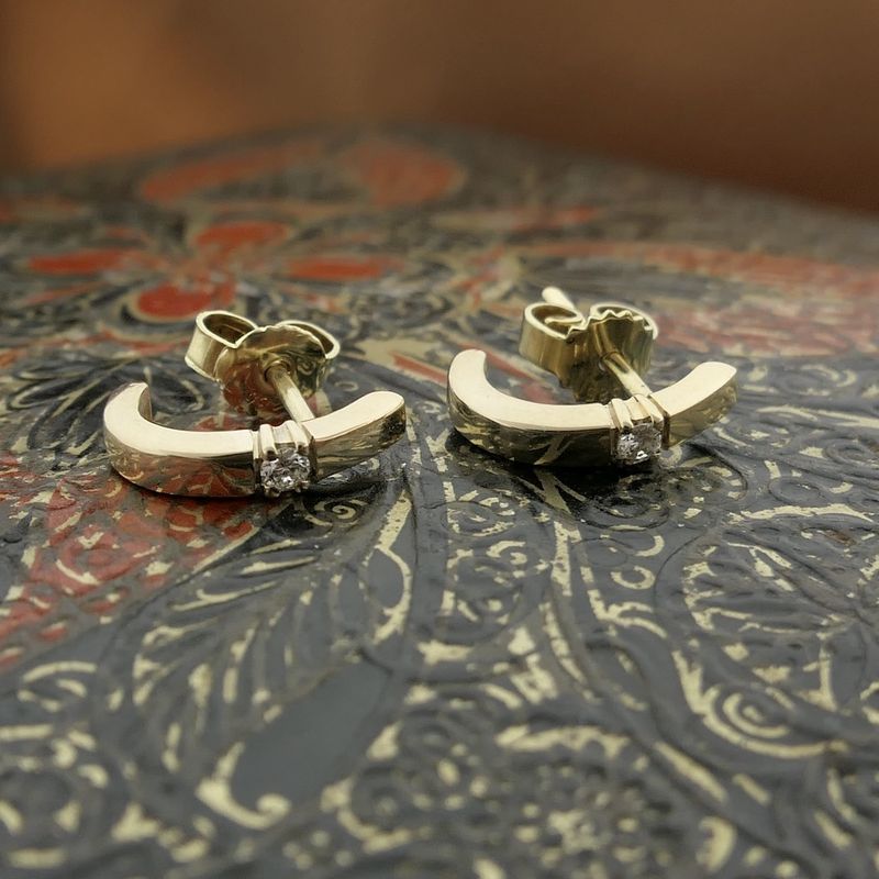 Image 2 of Gold stud earrings with diamond 0.06 ct.