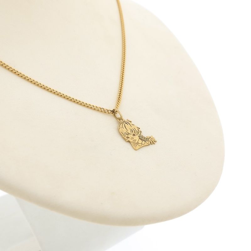 Image 5 of Gold pendant of a girl