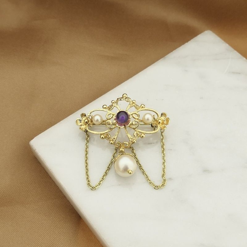 Image 2 of Gold brooch with pearls and purple glass bead