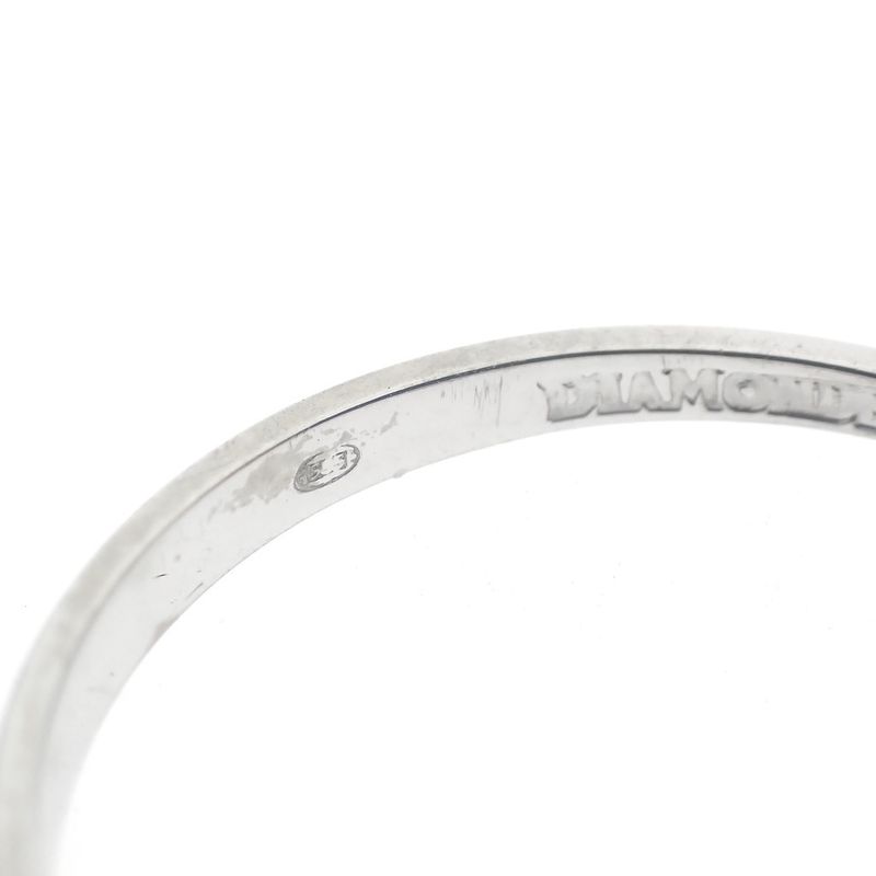 Image 6 of White gold solitaire ring with 0.03 ct diamond.