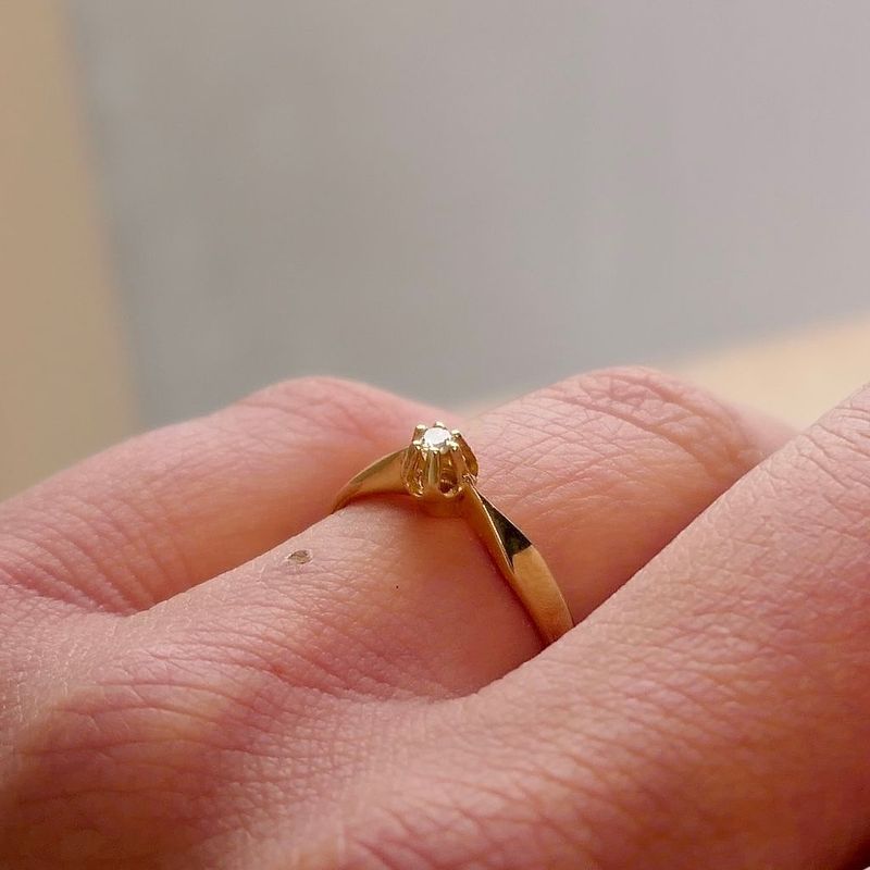 Image 7 of Gold solitaire ring with diamond; 0.03 ct.