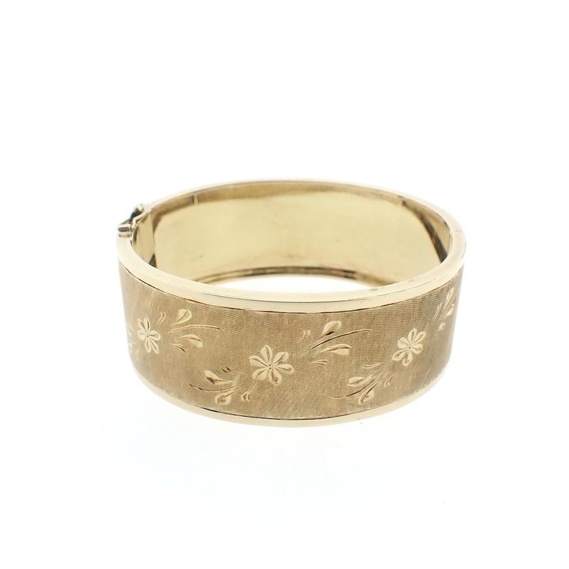 Image 1 of Vintage gold slave bracelet with engravings.