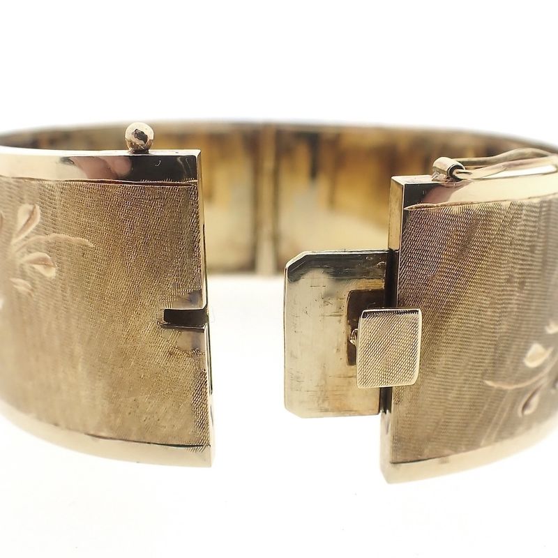 Image 3 of Vintage gold slave bracelet with engravings.