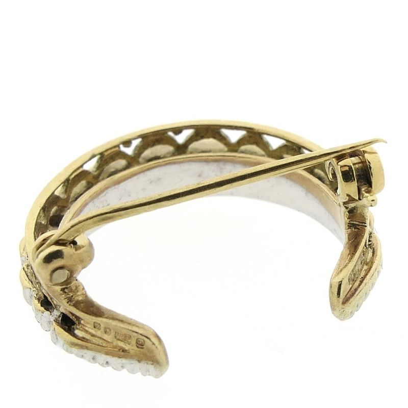 Image 9 of 9 carat brooch with sapphire and diamond; 0.34 ct.