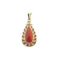 Antique gold pendant with blood coral