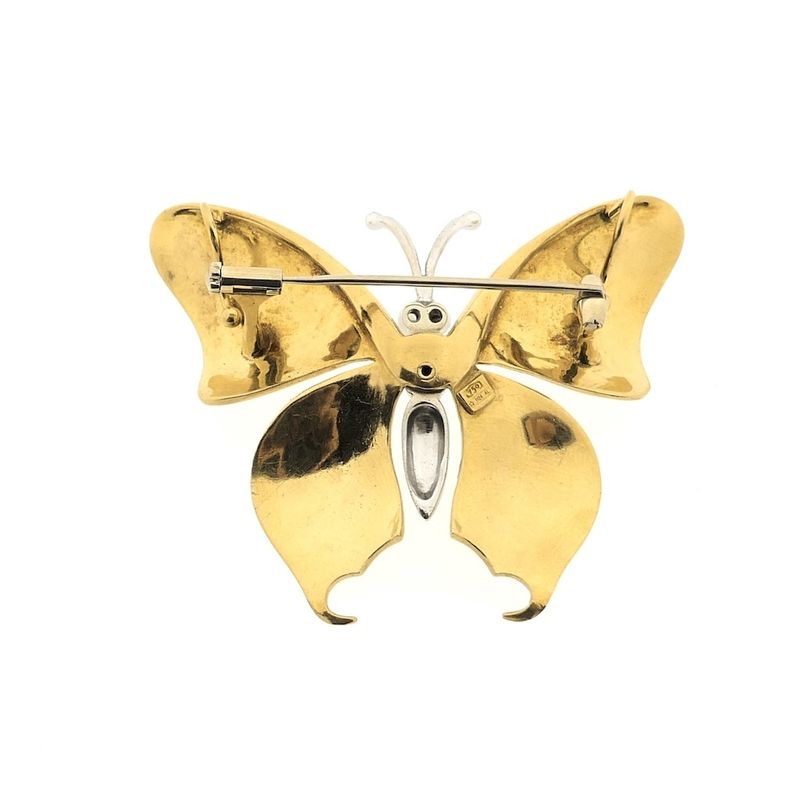 Image 4 of Two-tone gold brooch/pendant of a butterfly with enamel and diamond; 0.04 ct.