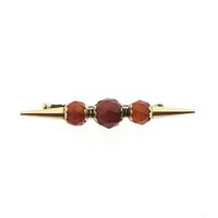 Vintage gold brooch with carnelian