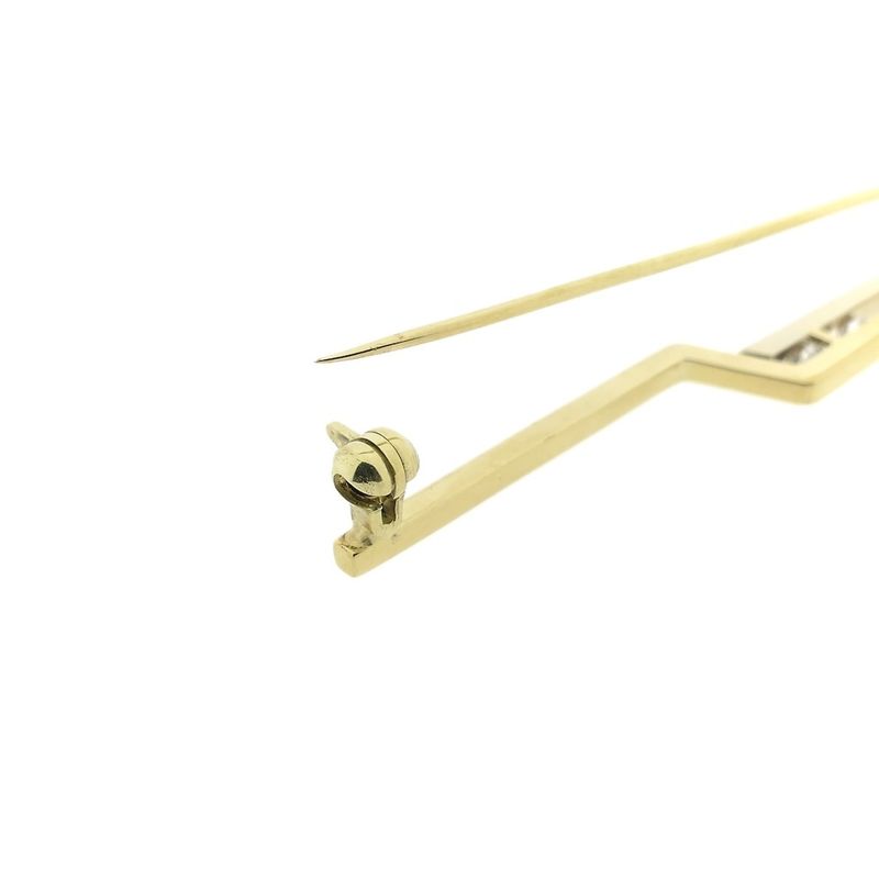Image 9 of Two-tone gold long narrow brooch with diamonds; 0.15 ct.
