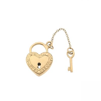 Image 1 of Gold pendant of a heart with a key