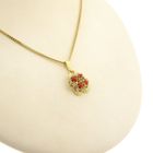 Image 4 of Gold floral pendant with blood coral